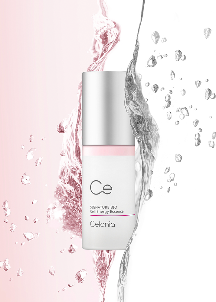 Celexonia skincare bottle with water droplets on a pink background