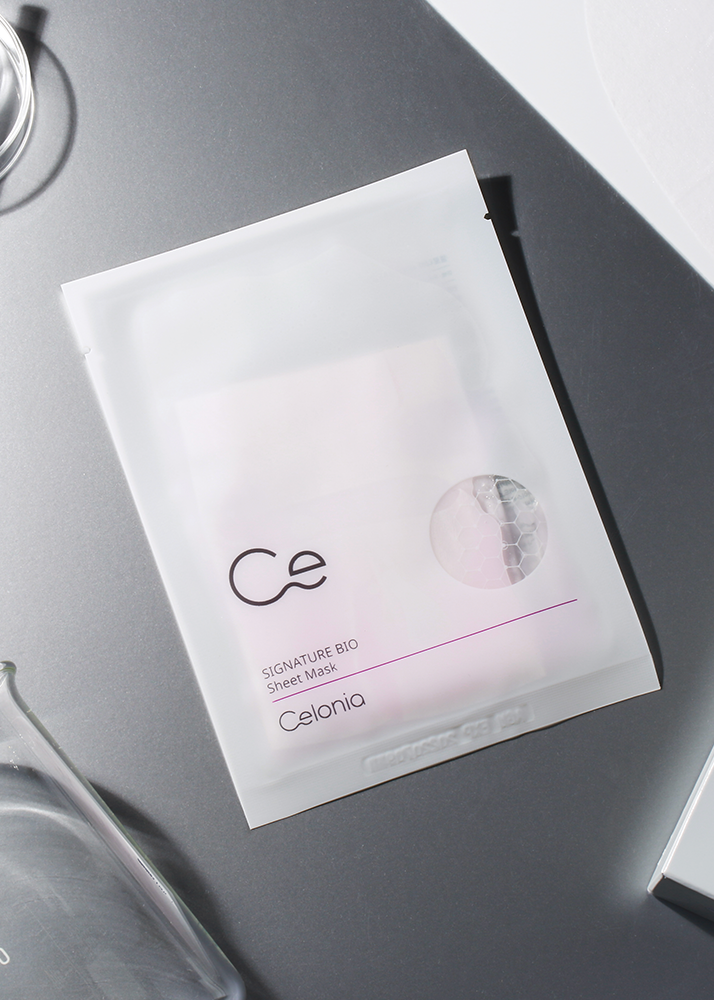 Celonia sheet mask packaging on a gray surface